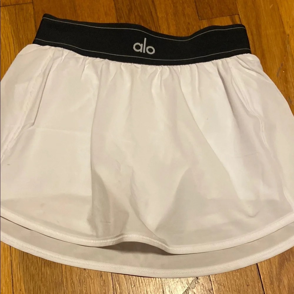 White Alo Skirt And Black Alo Top